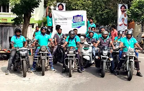 Saarathi Finance riders group with secured loans banner in Visakhapatnam